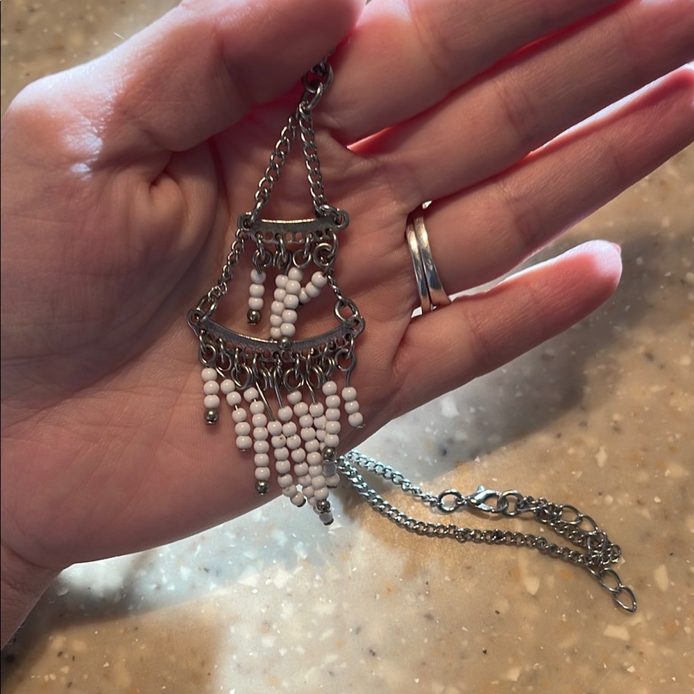 Silver and White Chandelier Necklace with Intricate Filigree